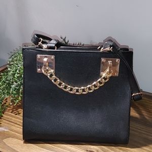 Black handbag with gold detailing